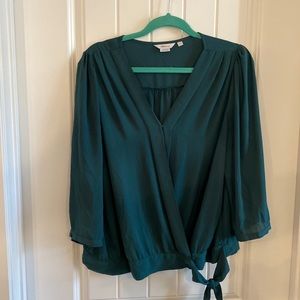 Reitmans forest green cross over top with a tie at bottom